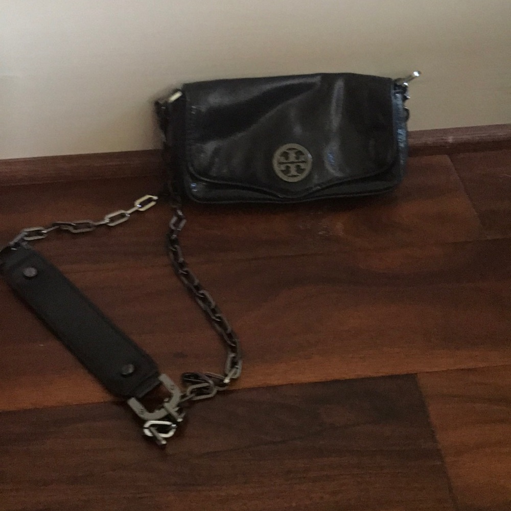 Black Tory Burch wallet on a chain side bag